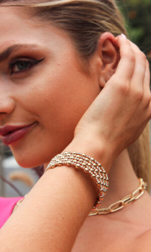 Brazalete de esferas doradas