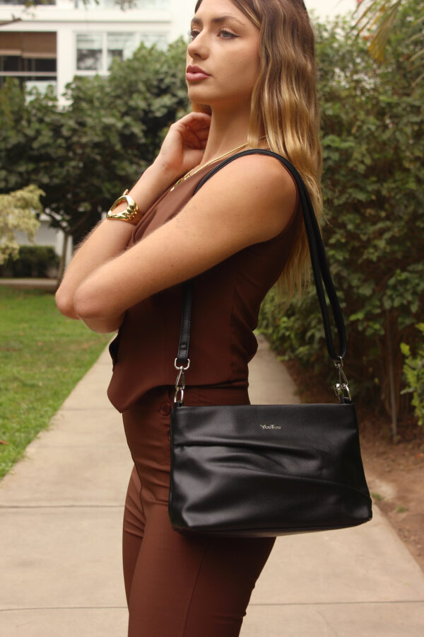Cartera con pliegues